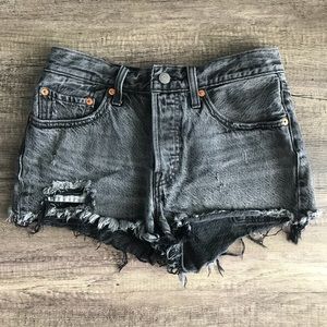 Levi’s 501 high waisted distressed black shorts